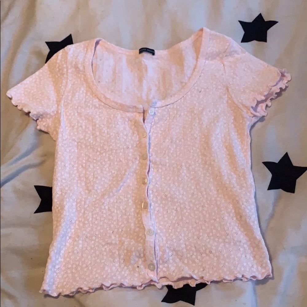 light by pink zelly ruflle top with flowers